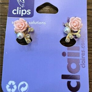 Claire’s floral diamond clip earrings